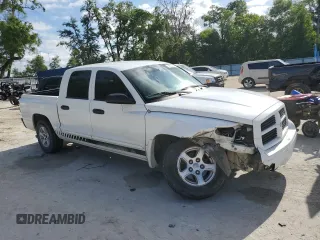2006 Dodge Dakota SLT with VIN 1D7HE48N46S605282, listed as a Copart auction lot 52635085 with 275,039 mi miles and Salvage Title. Bid and sale history available at DreamBid. Image 4.
