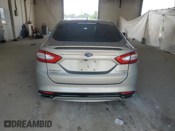 2016 Ford Fusion Titanium z VIN 3FA6P0K96GR117597, wystawiony jako Copart lot #62072525 z przebiegiem Nie podano mil oraz Czysty tytuł • Clean title. Historia ofert i sprzedaży dostępna na DreamBid. Obrazek 6.