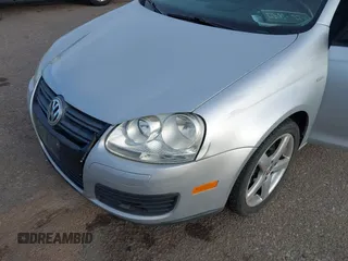 2010 Volkswagen Jetta Wolfsburg Edition with VIN 3VWRJ7AJ5AM049081, listed as a IAAI auction lot 41765760 with 123,621 mi miles and . Bid and sale history available at DreamBid. Image 6.