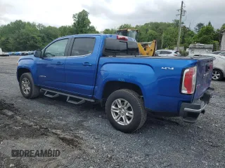 2019 GMC Canyon 4WD SLE z VIN 1GTG6CEN1K1206640, wystawiony jako Copart lot #55339285 z przebiegiem 52 166 mil mil oraz Szkody całkowita. Historia ofert i sprzedaży dostępna na DreamBid. Obrazek 2.