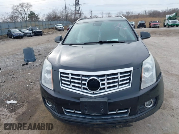 2015 Cadillac SRX Premium Collection with VIN 3GYFNGE37FS556860, listed as a IAAI auction lot 41854634 with 170,808 mi miles and . Bid and sale history available at DreamBid. Image 12.