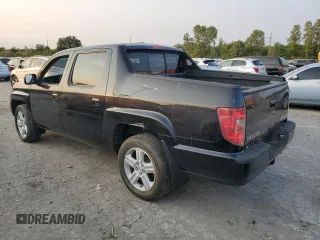 2010 Honda Ridgeline RTL with VIN 5FPYK1F52AB008326, listed as a Copart auction lot 71120074 with 157,688 mi miles and Salvage Title. Bid and sale history available at carsss.com. Image 2.