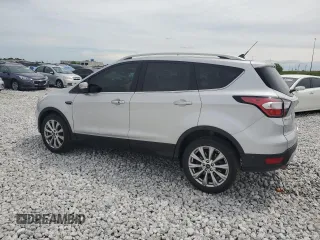 2018 Ford Escape Titanium with VIN 1FMCU9J99JUC89677, listed as a Copart auction lot 60421545 with 98,021 mi miles and Salvage title. Bid and sale history available at DreamBid. Image 2.