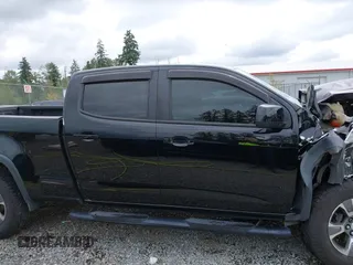 2015 Chevrolet Colorado 4WD Z71 with VIN 1GCGTCE31F1163480, listed as a IAAI auction lot 42544665 with 103,807 mi miles and . Bid and sale history available at DreamBid. Image 14.