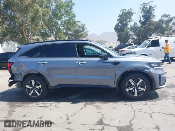 2021 Kia Sorento S with VIN 5XYRL4LCXMG073937, listed as a IAAI auction lot 42595810 with 71,507 mi miles and . Bid and sale history available at DreamBid. Image 14.