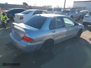 2004 Mitsubishi Lancer ES with VIN JA3AJ26E44U037047, listed as a IAAI auction lot 41545446 with 176,895 mi miles. Bid and sale history available at carsss.com. Image 4.