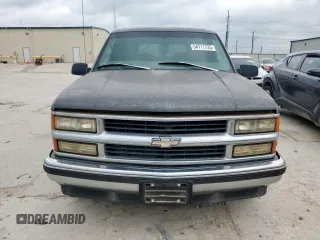 1999 Chevrolet Suburban with VIN 1GBEC16R0XJ434453, listed as a Copart auction lot 54711725 with 179,597 mi miles and Clean title. Bid and sale history available at DreamBid. Image 5.