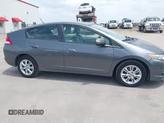 2010 Honda Insight EX with VIN JHMZE2H74AS040110, listed as a IAAI auction lot 42643669 with 189,531 mi miles and . Bid and sale history available at DreamBid. Image 13.