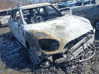 2019 MINI Countryman Cooper S with VIN WMZYT5C58K3E70294, listed as a IAAI auction lot 41495640 with 23,982 mi miles. Bid and sale history available at carsss.com. Image 1.