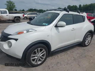 2014 Nissan Juke Nismo with VIN JN8AF5MV8ET355062, listed as a IAAI auction lot 42682377 with 134,118 mi miles and . Bid and sale history available at DreamBid. Image 2.