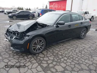 2021 BMW 3 Series 330i xDrive with VIN 3MW5R7J08M8C16500, listed as a IAAI auction lot 41469052 with 21,660 mi miles. Bid and sale history available at carsss.com. Image 2.