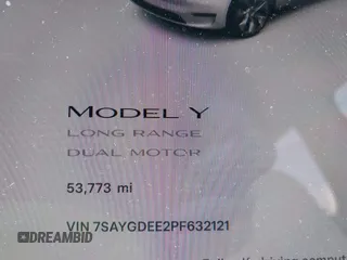 2023 Tesla Model Y Long Range with VIN 7SAYGDEE2PF632121, listed as a IAAI auction lot 41798780 with 53,773 mi miles. Bid and sale history available at carsss.com. Image 15.