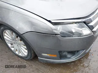 2012 Ford Fusion Hybrid with VIN 3FADP0L34CR215667, listed as a IAAI auction lot 41957936 with 158,914 mi miles and . Bid and sale history available at DreamBid. Image 12.