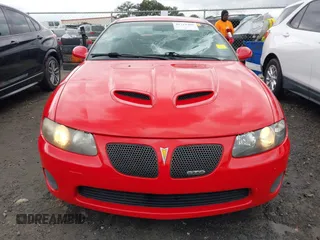 2005 Pontiac GTO with VIN 6G2VX12U05L370479, listed as a IAAI auction lot 41721469 with 86,683 mi miles. Bid and sale history available at carsss.com. Image 12.