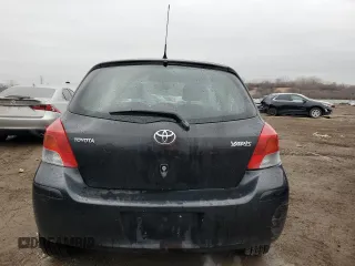 2011 Toyota Yaris with VIN JTDJT4K37B5339113, listed as a Copart auction lot 82474554 with 148,800 mi miles and Salvage Title. Bid and sale history available at carsss.com. Image 6.