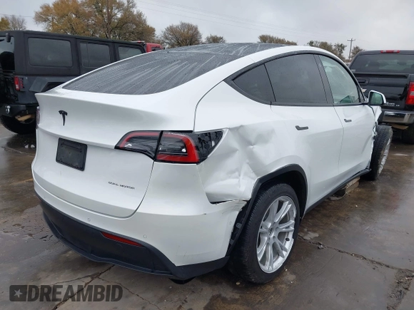 2022 Tesla Model Y Long Range with VIN 7SAYGDEE3NF380067, listed as a IAAI auction lot 41016704 with 52,180 mi miles and . Bid and sale history available at DreamBid. Image 4.