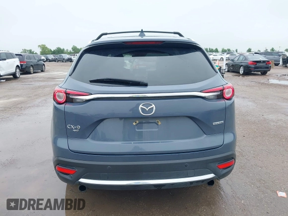 2021 Mazda CX-9 Grand Touring with VIN JM3TCBDY9M0534966, listed as a IAAI auction lot 42166071 with 77,817 mi miles and . Bid and sale history available at DreamBid. Image 16.