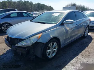 2013 Hyundai Sonata SE with VIN 5NPEC4AC9DH647065, listed as a IAAI auction lot 41636762 with 148,669 mi miles. Bid and sale history available at carsss.com. Image 18.