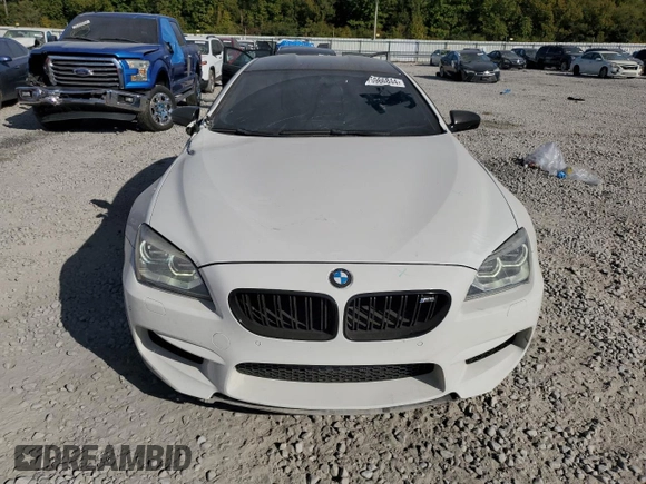 2015 BMW M6 z VIN WBS6C9C58FD467867, wystawiony jako Copart lot #75966844 z przebiegiem 94 102 mil mil oraz Szkoda całkowita • Salvage title. Historia ofert i sprzedaży dostępna na DreamBid. Obrazek 5.