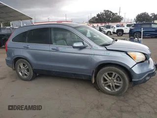 2009 Honda CR-V EX-L with VIN JHLRE38759C002661, listed as a IAAI auction lot 41956424 with 162,685 mi miles and . Bid and sale history available at carsss.com. Image 13.