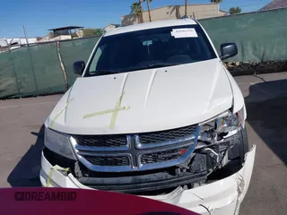 2014 Dodge Journey American Value Pkg with VIN 3C4PDCAB5ET230096, listed as a IAAI auction lot 41846510 with 178,397 mi miles. Bid and sale history available at carsss.com. Image 6.