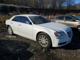 2014 Chrysler 300 C with VIN 2C3CCAKG7EH379106, listed as a Copart auction lot 83664344 with 132,536 mi miles and Salvage Title. Bid and sale history available at carsss.com. Image 4.