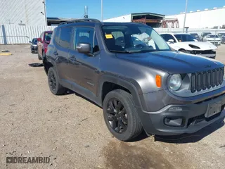 2016 Jeep Renegade Latitude with VIN ZACCJBBT0GPE12727, listed as a IAAI auction lot 41722294 with 114,561 mi miles. Bid and sale history available at carsss.com. Image 1.