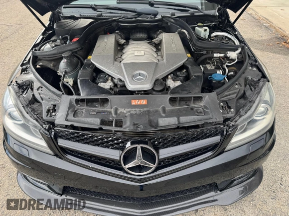 2012 Mercedes-Benz C 63 AMG with VIN WDDGF7HB5CA629883, listed as a Copart auction lot 49139875 with 139,727 mi miles and Clean Title. Bid and sale history available at carsss.com. Image 7.