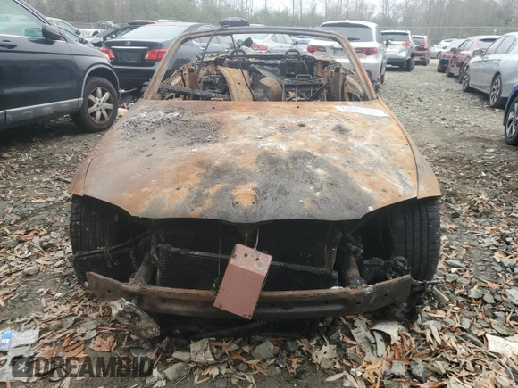 2011 BMW 1 Series 135i with VIN WBAUN7C52BVM23944, listed as a Copart auction lot 84061924 with Not provided miles and Salvage title. Bid and sale history available at DreamBid. Image 5.