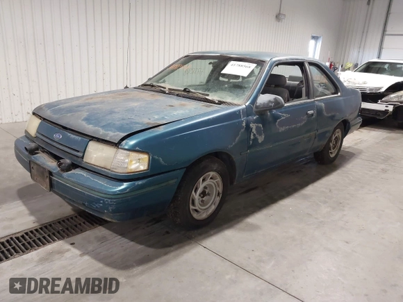1993 Ford Tempo z VIN 1FAPP31X5PK229656, wystawiony jako IAAI lot #41788568 z przebiegiem 64 620 mil mil oraz . Historia ofert i sprzedaży dostępna na DreamBid. Obrazek 2.