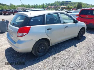 2004 Toyota Matrix Std with VIN 2T1KR32E04C292673, listed as a IAAI auction lot 42141653 with 299,999 mi miles. Bid and sale history available at carsss.com. Image 4.