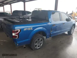 2018 Ford F-150 XL with VIN 1FTEW1CP9JKC79943, listed as a IAAI auction lot 41211868 with 103,035 mi miles. Bid and sale history available at carsss.com. Image 4.