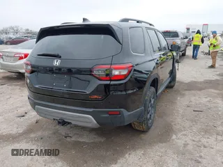 2023 Honda Pilot TrailSport with VIN 5FNYG1H63PB051646, listed as a IAAI auction lot 41069614 with 28,730 mi miles. Bid and sale history available at carsss.com. Image 4.