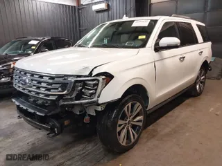 2021 Ford Expedition Limited with VIN 1FMJU2AT1MEA43036, listed as a IAAI auction lot 41941832 with 39,297 mi miles. Bid and sale history available at carsss.com. Image 2.