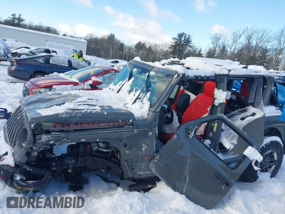 2020 Jeep Wrangler Unlimited Rubicon z VIN 1C4HJXFN5LW176104, wystawiony jako IAAI lot #41332511 z przebiegiem 70 428 mil mil oraz . Historia ofert i sprzedaży dostępna na DreamBid. Obrazek 12.