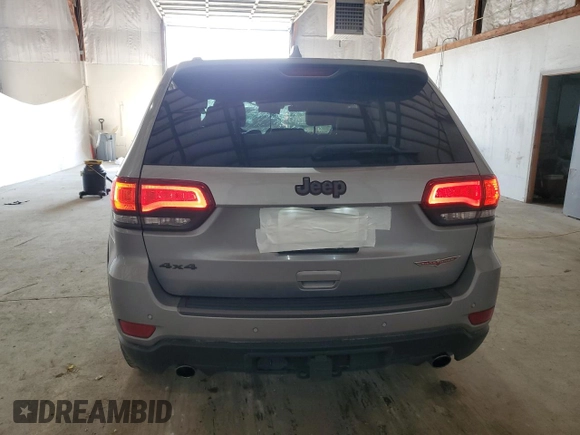 2021 Jeep Grand Cherokee Trailhawk z VIN 1C4RJFLG9MC502171, wystawiony jako Copart lot #59328045 z przebiegiem 154 012 mil mil oraz Szkoda całkowita • Salvage title. Historia ofert i sprzedaży dostępna na DreamBid. Obrazek 6.