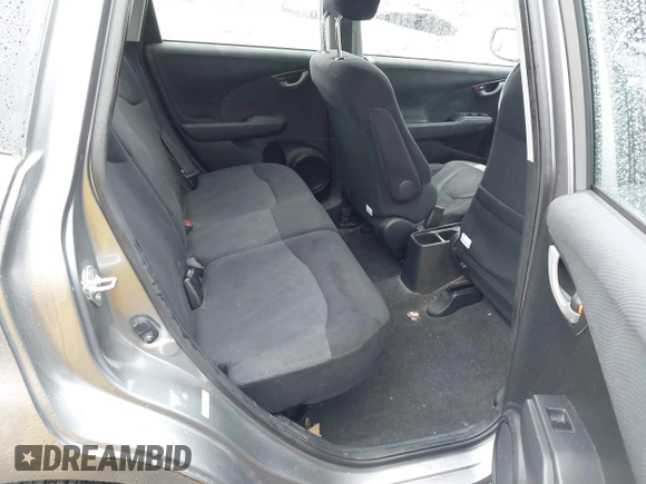 2009 Honda Fit Sport with VIN JHMGE88419S013460, listed as a IAAI auction lot 41994669 with 78,954 mi miles. Bid and sale history available at carsss.com. Image 8.
