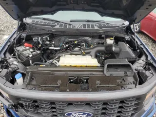 2024 Ford F-150 STX with VIN 1FTEW2KP1RFA60745, listed as a Copart auction lot 43377715 with 15,781 mi miles and Salvage Title. Bid and sale history available at carsss.com. Image 11.