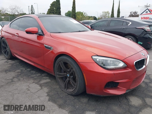 2013 BMW M6 z VIN WBSLX9C55DC968497, wystawiony jako IAAI lot #41863884 z przebiegiem 128 241 mil mil oraz . Historia ofert i sprzedaży dostępna na DreamBid. Obrazek 1.