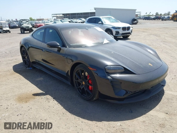 2022 Porsche Taycan GTS z VIN WP0AD2Y12NSA59275, wystawiony jako IAAI lot #42170547 z przebiegiem 43 757 mil mil oraz . Historia ofert i sprzedaży dostępna na DreamBid. Obrazek 1.