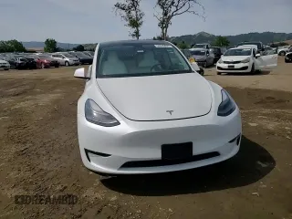 2023 Tesla Model Y Long Range z VIN 7SAYGDEE3PF815088, wystawiony jako Copart lot #54849895 z przebiegiem 19 637 mil mil oraz Szkoda całkowita • Salvage title. Historia ofert i sprzedaży dostępna na DreamBid. Obrazek 14.