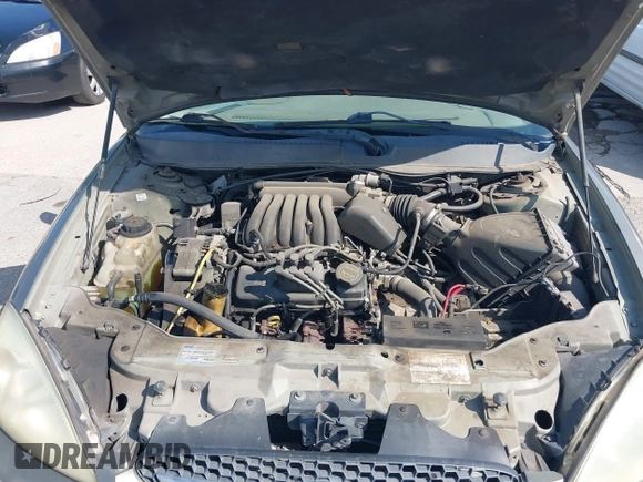 2003 Ford Taurus SE Standard z VIN 1FAFP53UX3A228383, wystawiony jako IAAI lot #42700752 z przebiegiem 182 598 mil mil oraz . Historia ofert i sprzedaży dostępna na DreamBid. Obrazek 10.