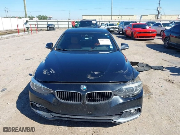 2019 BMW 4 Series 430i with VIN WBA4J1C56KBM13881, listed as a IAAI auction lot 41657332 with 125,147 mi miles. Bid and sale history available at carsss.com. Image 12.