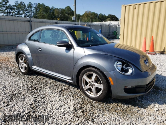 2014 Volkswagen Beetle 2.5L w/Sun with VIN 3VWJP7AT4EM612608, listed as a Copart auction lot 74679104 with 141,559 mi miles and Salvage Title. Bid and sale history available at DreamBid. Image 4.