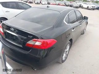 2013 Infiniti M37 with VIN JN1BY1AP0DM514046, listed as a IAAI auction lot 42031499 with 219,726 mi miles. Bid and sale history available at carsss.com. Image 4.