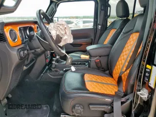 2021 Jeep Wrangler Unlimited Rubicon with VIN 1C4HJXFG5MW542260, listed as a Copart auction lot 59476655 with 19,870 mi miles and Salvage title. Bid and sale history available at DreamBid. Image 7.