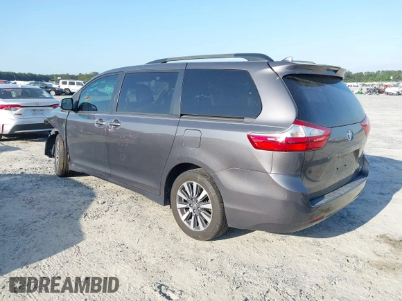 2018 Toyota Sienna LE with VIN 5TDJZ3DC3JS190746, listed as a IAAI auction lot 42161562 with 180,000 mi miles and . Bid and sale history available at DreamBid. Image 3.