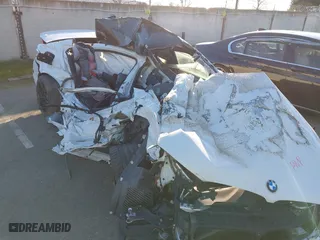 2019 BMW M5 with VIN WBSJF0C50KB284594, listed as a IAAI auction lot 41410008 with 1 mi miles. Bid and sale history available at carsss.com. Image 6.