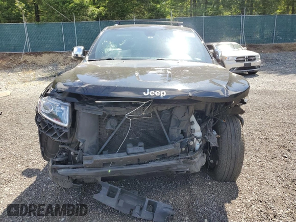 2014 Jeep Grand Cherokee Limited with VIN 1C4RJFBG2EC254977, listed as a Copart auction lot 63084215 with 155,022 mi miles and Salvage title. Bid and sale history available at DreamBid. Image 5.
