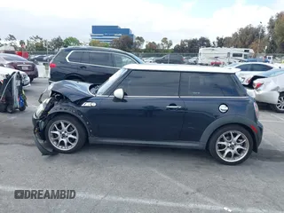 2007 MINI Hardtop S with VIN WMWMF73557TT80376, listed as a IAAI auction lot 42067228 with 174,262 mi miles and . Bid and sale history available at DreamBid. Image 14.